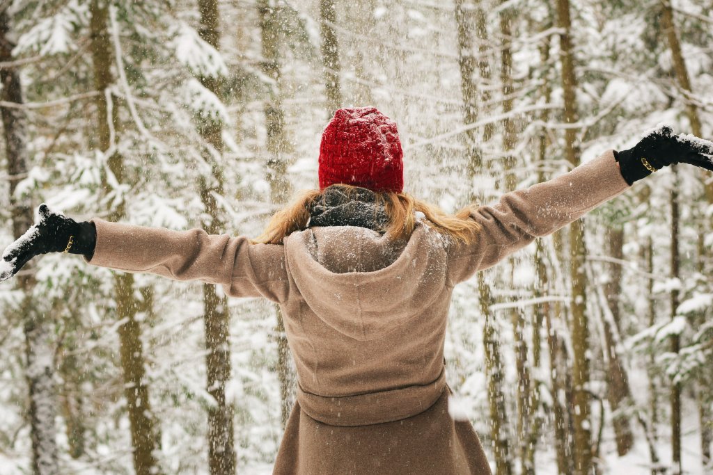 a women with her hands in the air