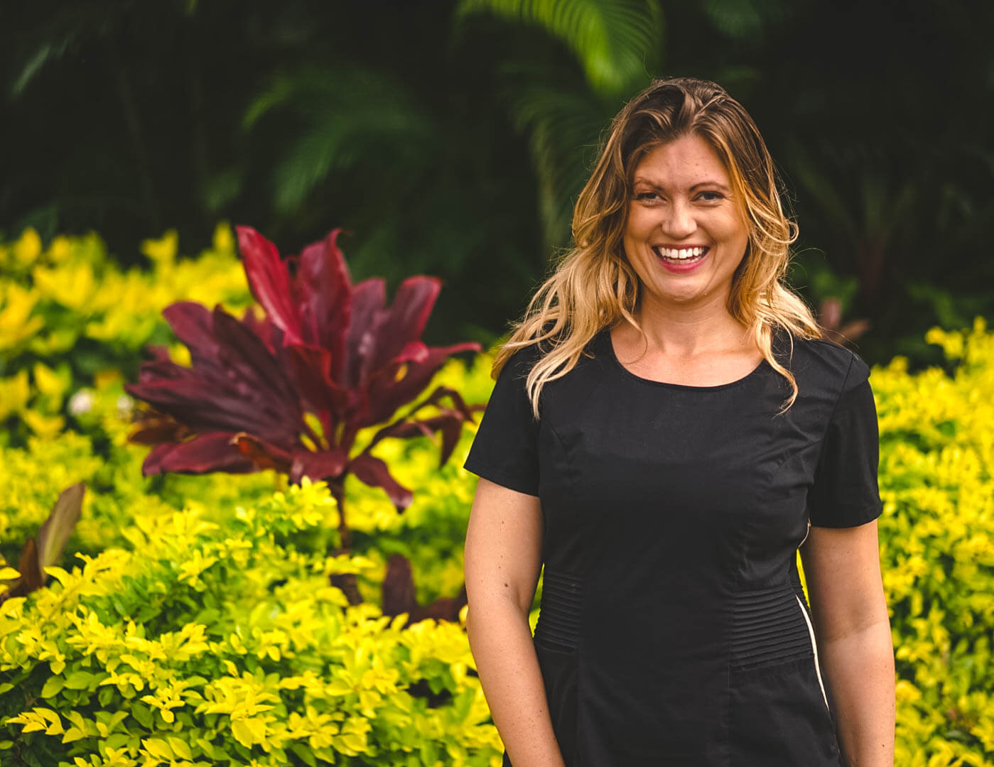 a women wearing black scrubs