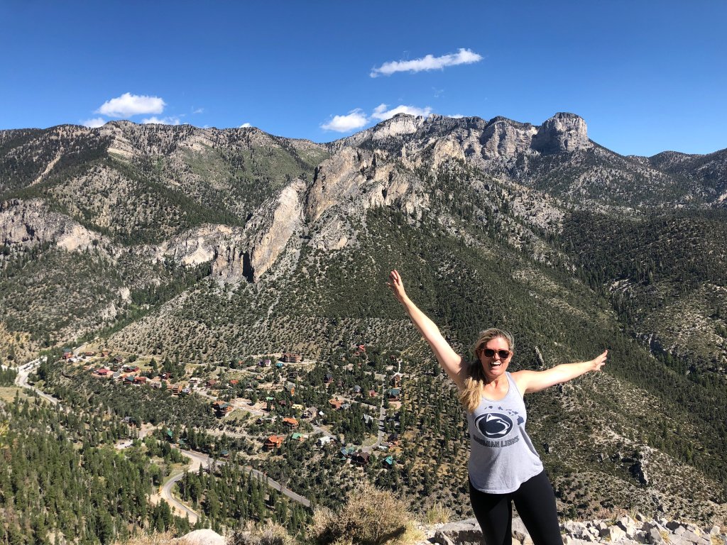 woman on top of cathedral rock