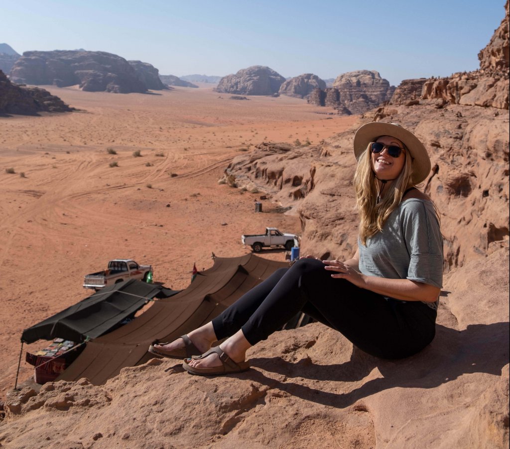 a women sitting in Wadi Rum desert in Jordan