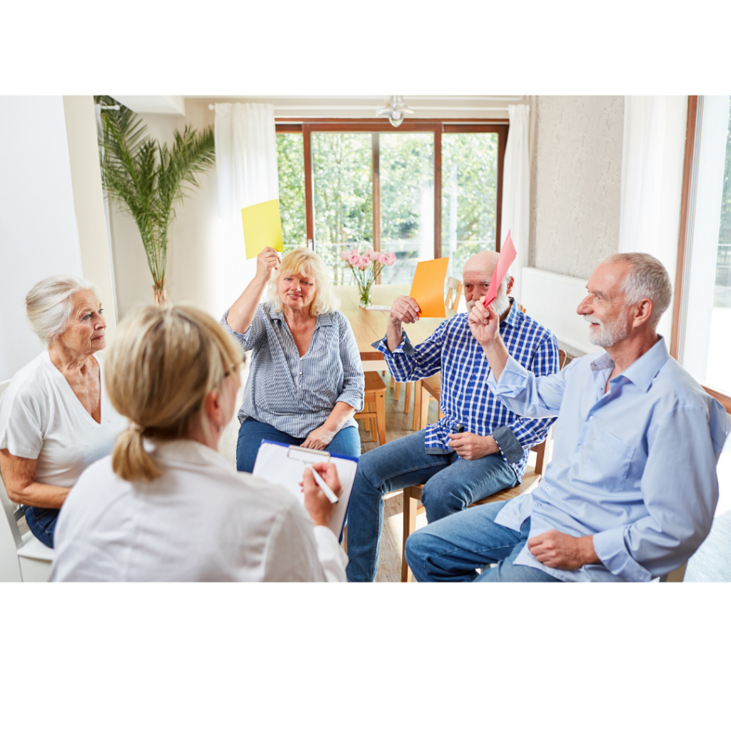 a group of adults doing a group therapy session with a clinician