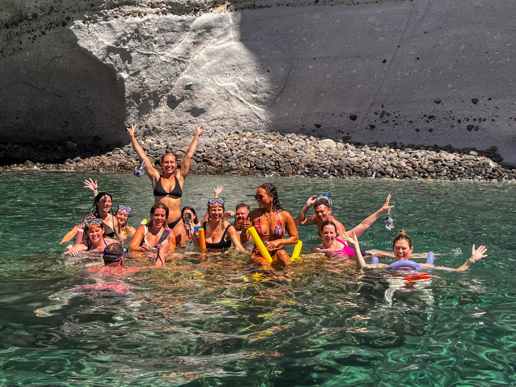 a group of people in the water