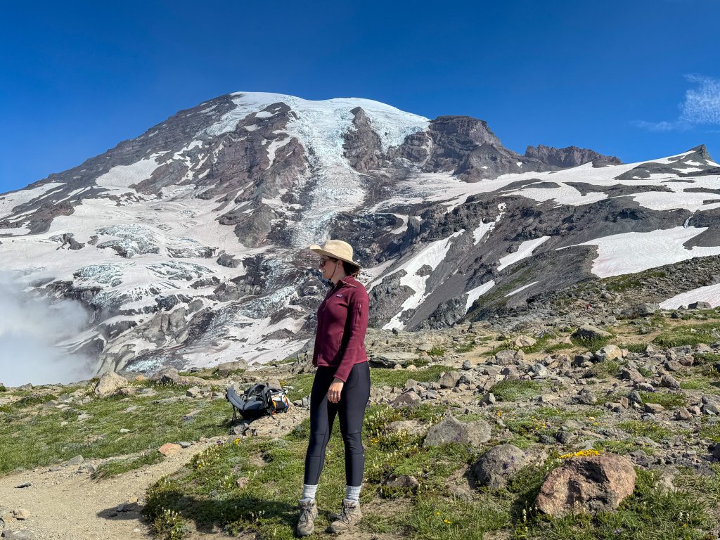 a women standing on a mountain