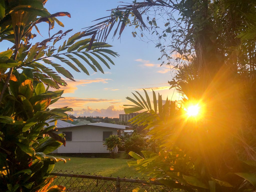 sunset over a house