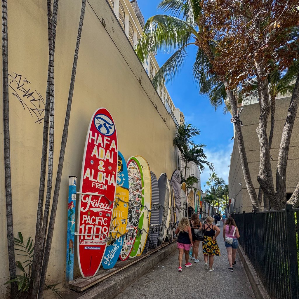 surf boards lining a hotel in Waikiki