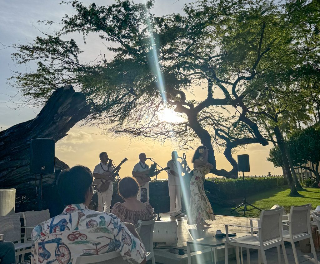 a hula show at sunset