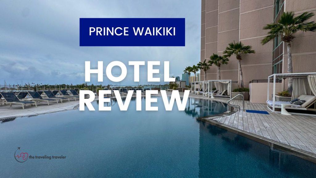 picture of a pool with the words "prince waikiki hotel review" written on the pool