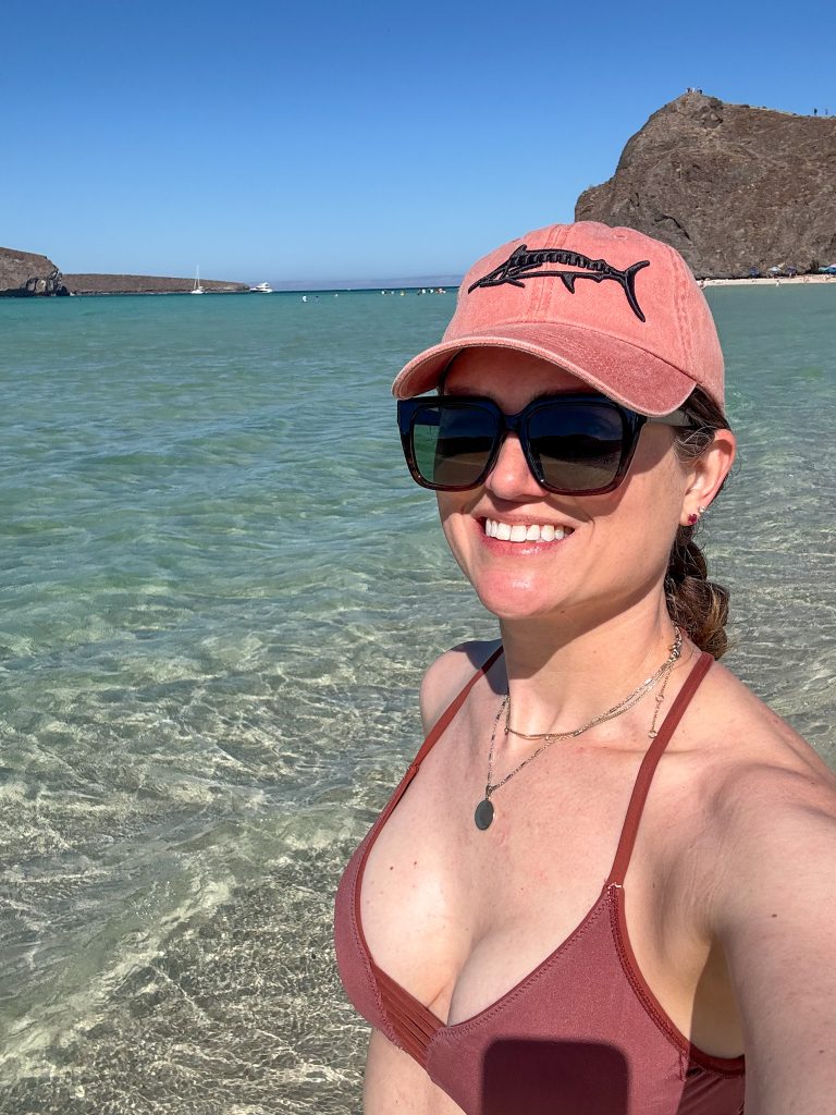 a women taking a selfie in the ocean